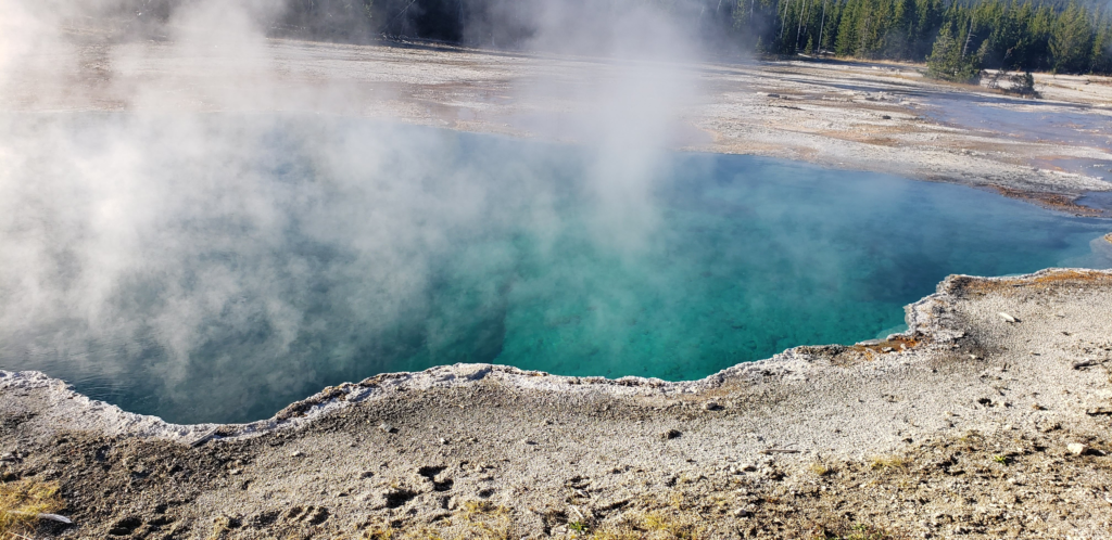 Yellowstone mudpots and steam vents in a thermal area with boardwalk access